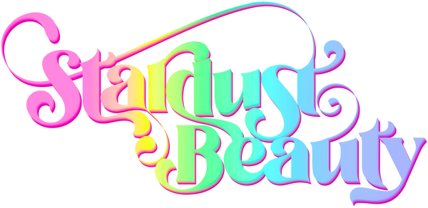 The words 'Stardust Beauty' are rendered in a stylized, decorative script with a rainbow gradient effect on a plain white background.